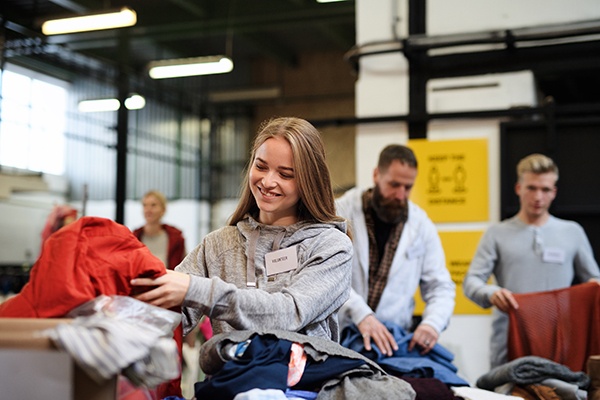 volunteers sorting out donated clothes in communit 2021 08 31 14 39 48 utc